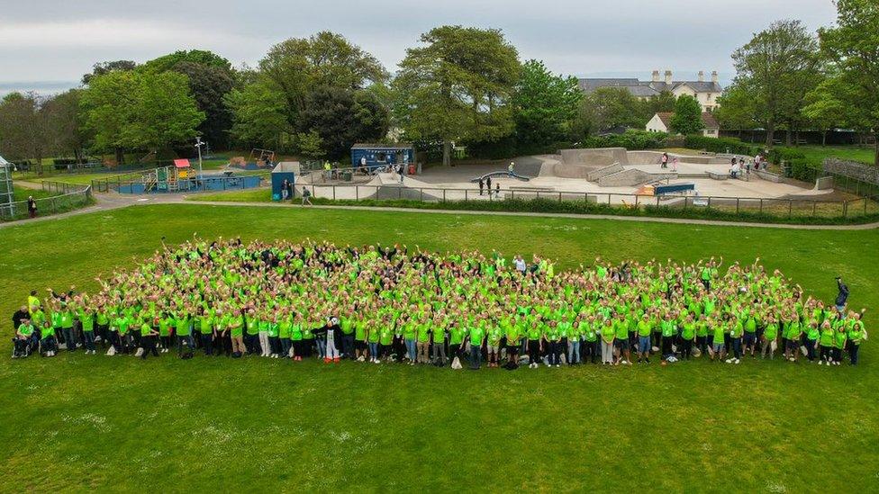 Drone shot of group gathered outside for games