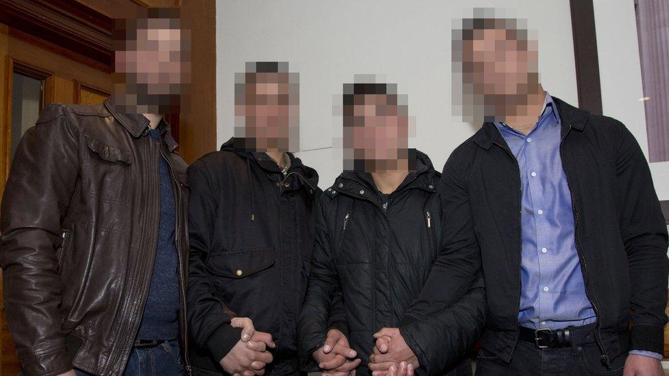 The four Syrian refugees with their faces pixelated