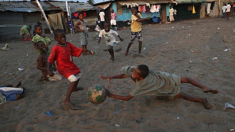 Children play soccer in the West Point township on January 31, 2015 in Monrovia, Liberia.