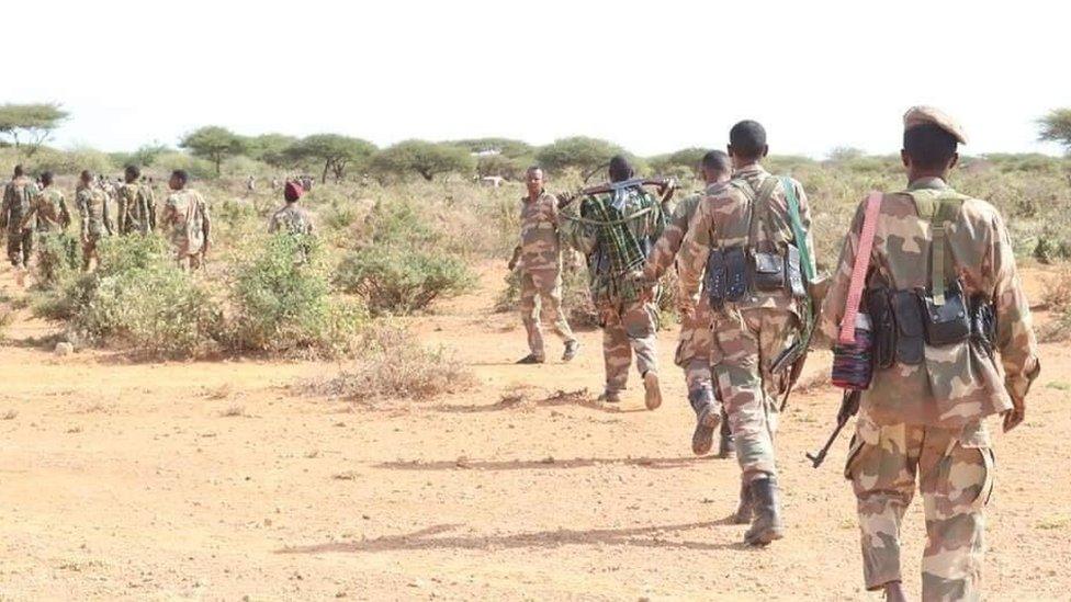 Somalian Army members patrol during an operation against al-Shabab