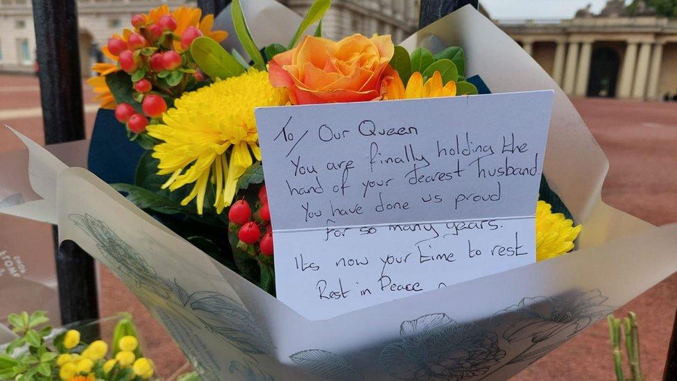 Card with flowers on gates