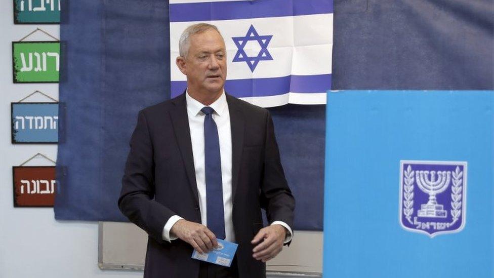 Benny Gantz of Israel's Blue and White party votes in Israel's second election of 2019 on 17 September.