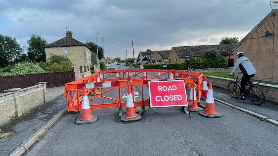 Road closure around sinkhole