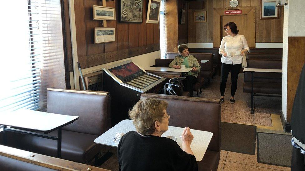 People enjoying a coffee in Station Cafe