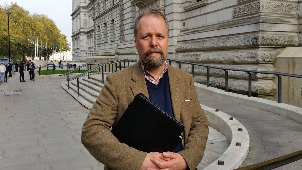 Campaigner Richard Allen outside HMRC offices in London