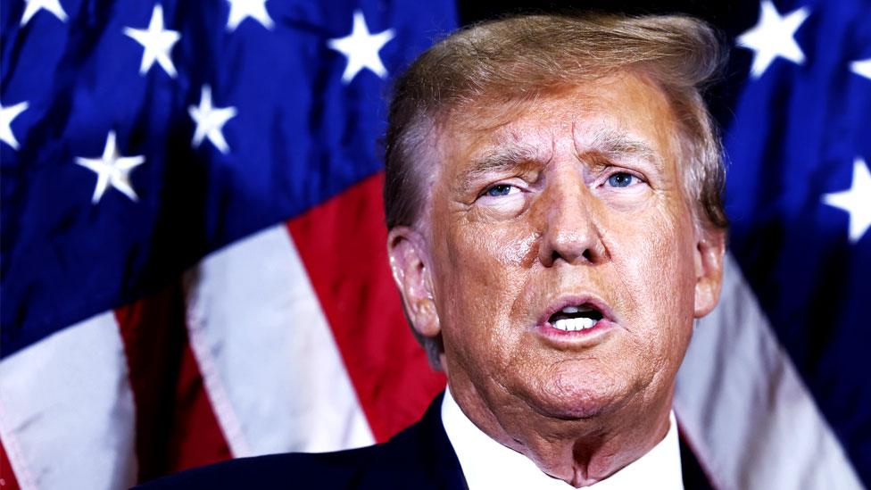 Donald Trump speaks to reporters before his speech at the annual Conservative Political Action Conference at Gaylord National Resort & Convention Center on 4 March 2023 in National Harbor, Maryland