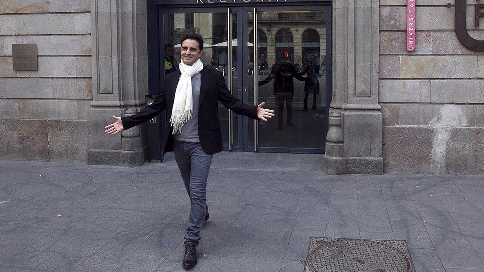 Hervé Falciani gestures after casting his vote in European elections in Barcelona on May 25, 2014