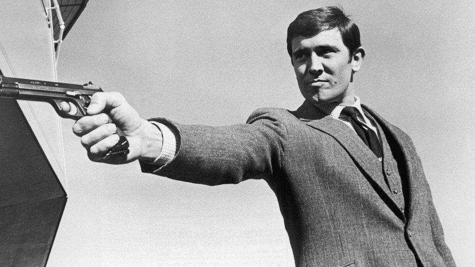 George Lazenby as James Bond