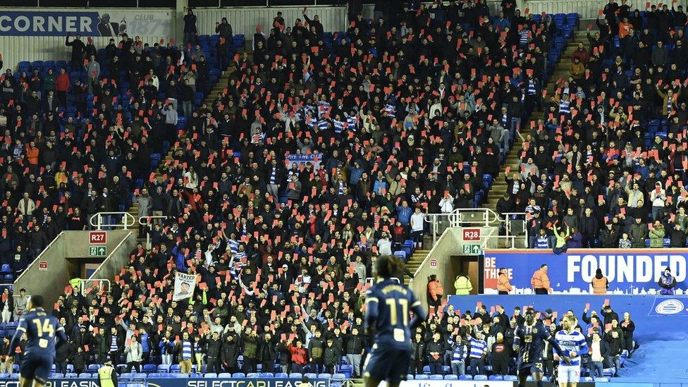 Reading Fans holding red cards