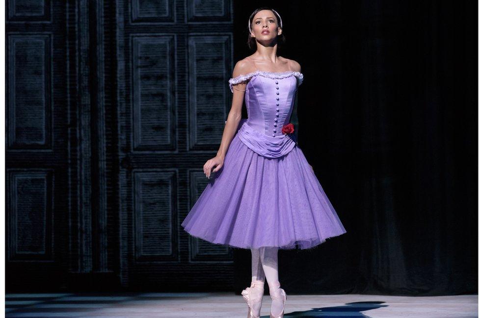 Francesca Hayward as Alice in Alice in Wonderland