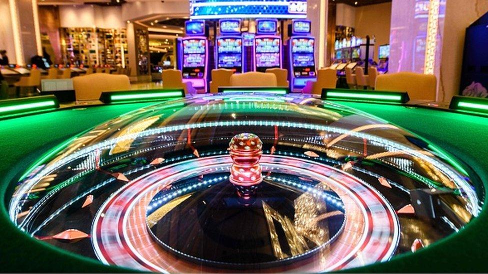 Interior view shows gaming machines in the casino of the MGM Cotai resort in Macau.