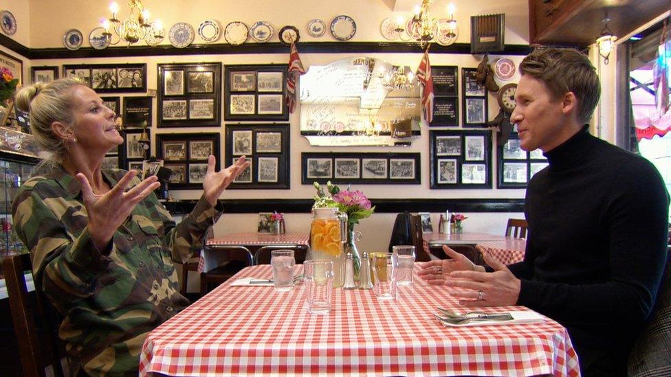 Ulrika Jonsson and Dustin Lance Black at the table