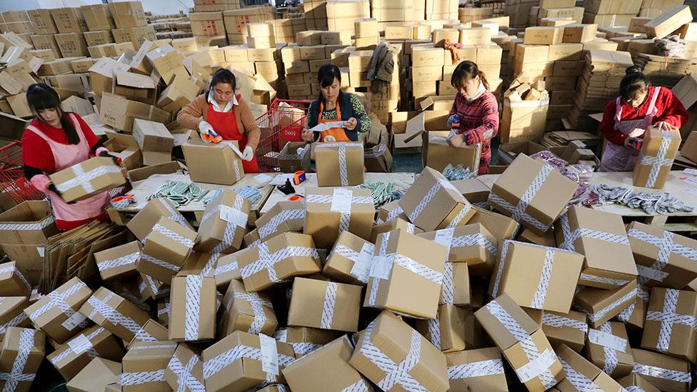 Women packing parcels