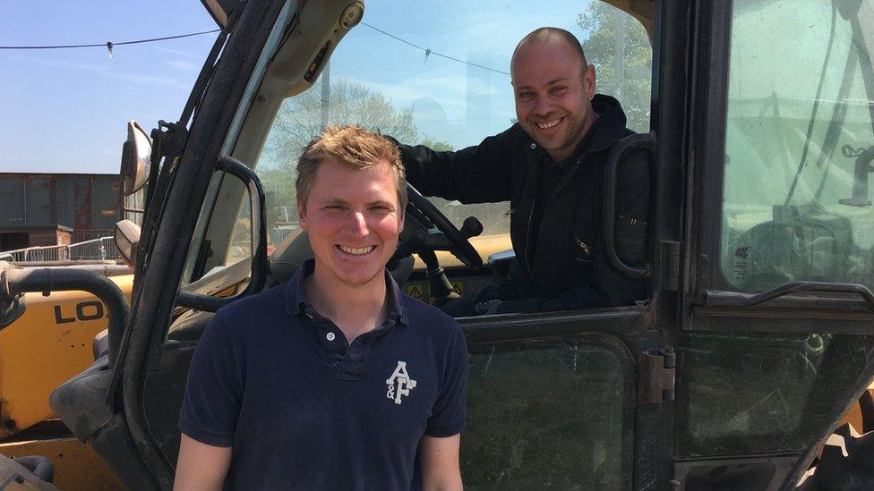 Richard and Fifi using a tractor