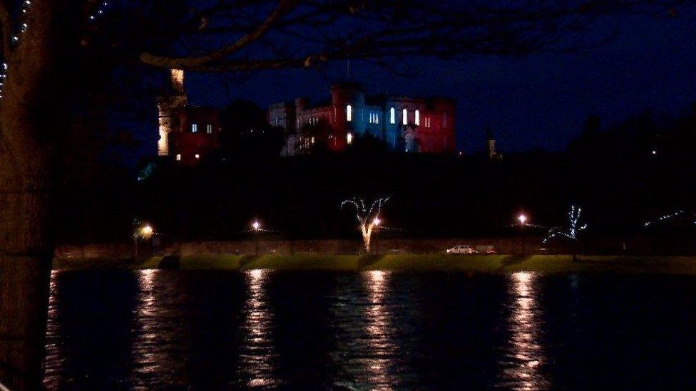 Inverness Castle lit up in the colours of the French flag