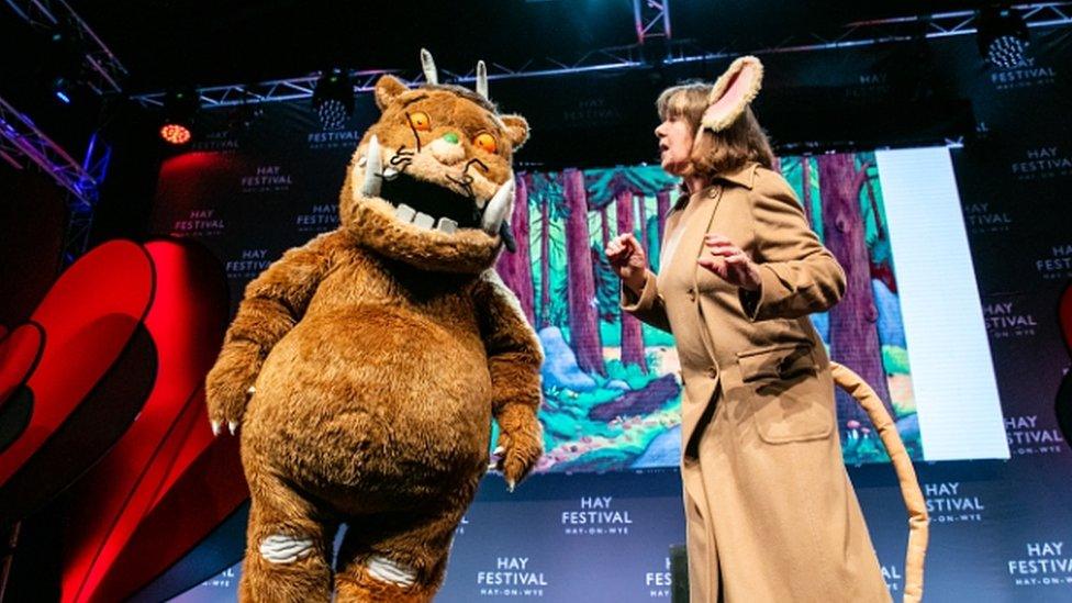 Julia Donaldson on stage with the Gruffalo