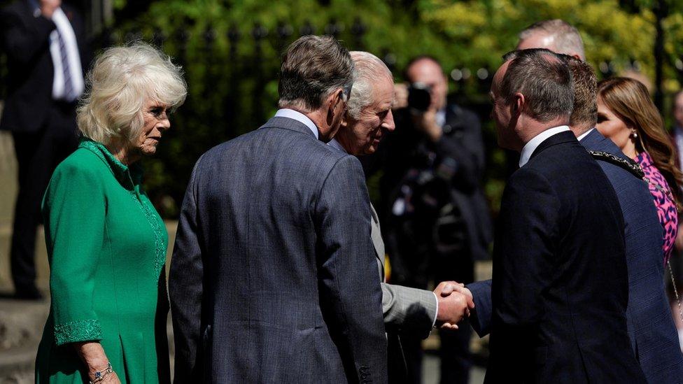 King Charles and Queen Camilla greet people during a visit to Market Theatre Square in Armagh, Northern Ireland