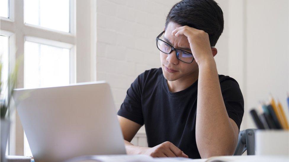 teenager with laptop