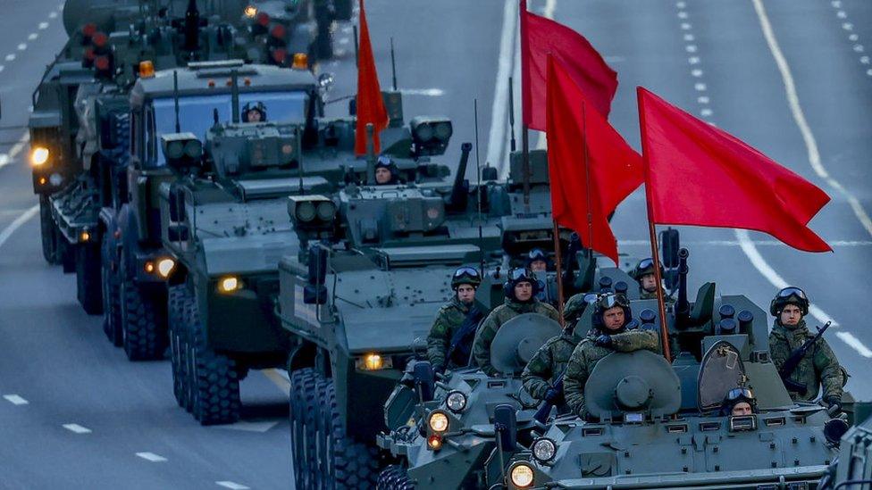 Russian military vehicles move along Tverskaya street during the rehearsal of Victory Day military parade marking the 77th anniversary of the victory over Nazi Germany in World War I