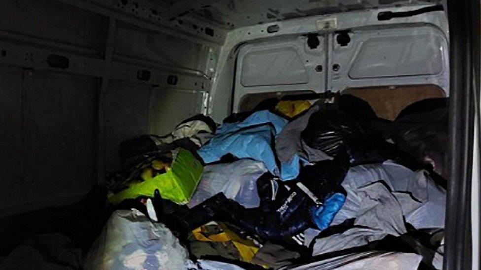 Bags of clothes found in a van in Cambourne, Cambridgeshire