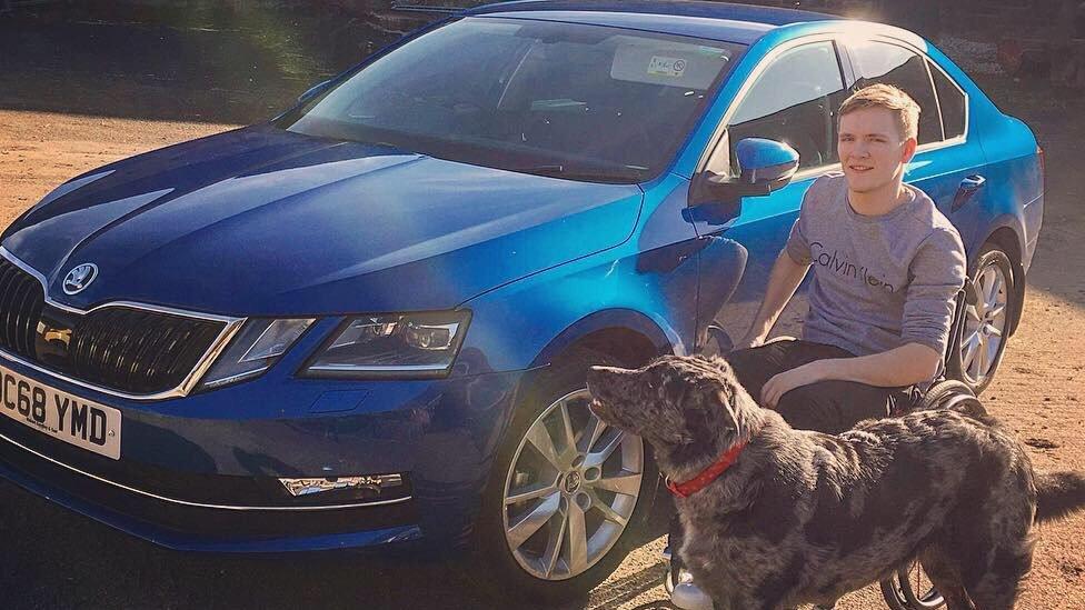 Daniel Moseley with his car