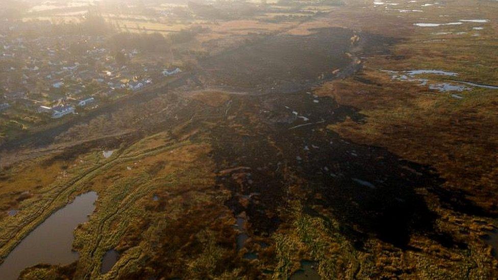 Overhead image shows scale of scorched damage