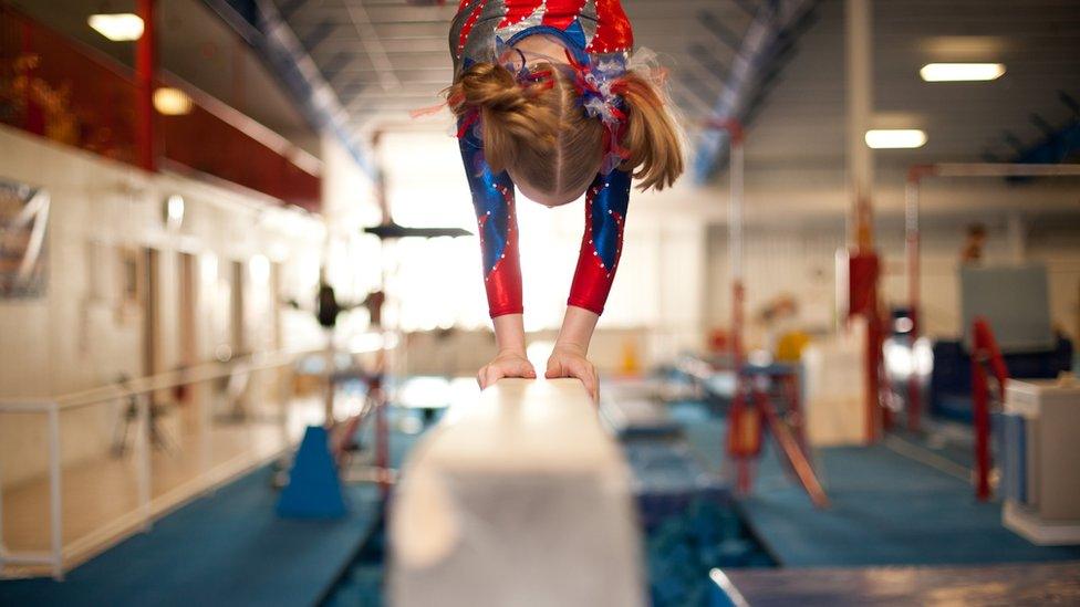 child on a balance beam