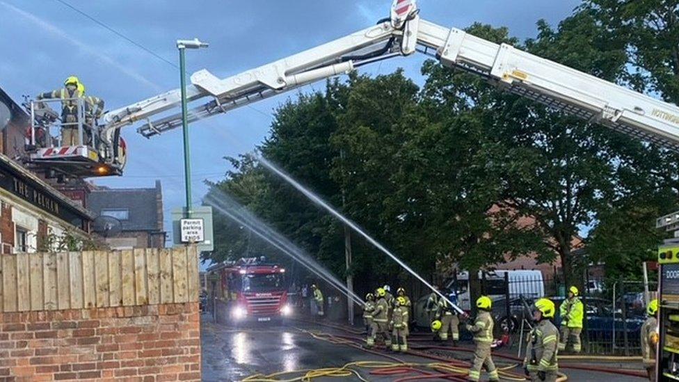 The aerial ladder at the scene of the fire