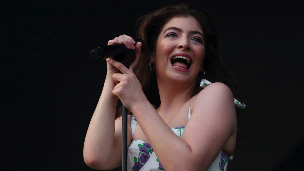 Lorde performing on stage