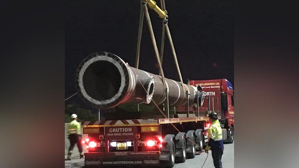 The exchanger being loaded on to a lorry