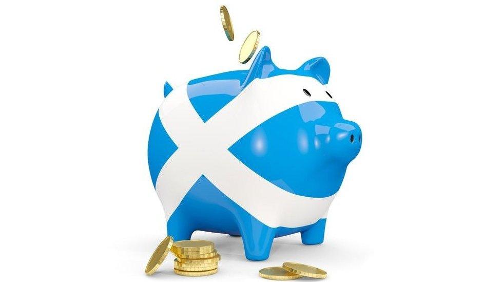 piggy bank covered in saltire