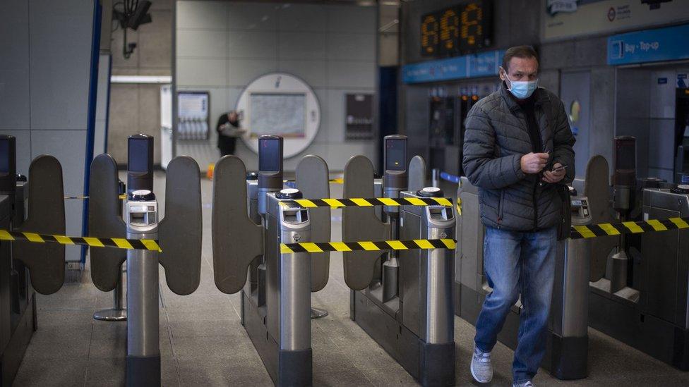 Alternate ticket barriers are taped off at Waterloo tube station on the London Underground