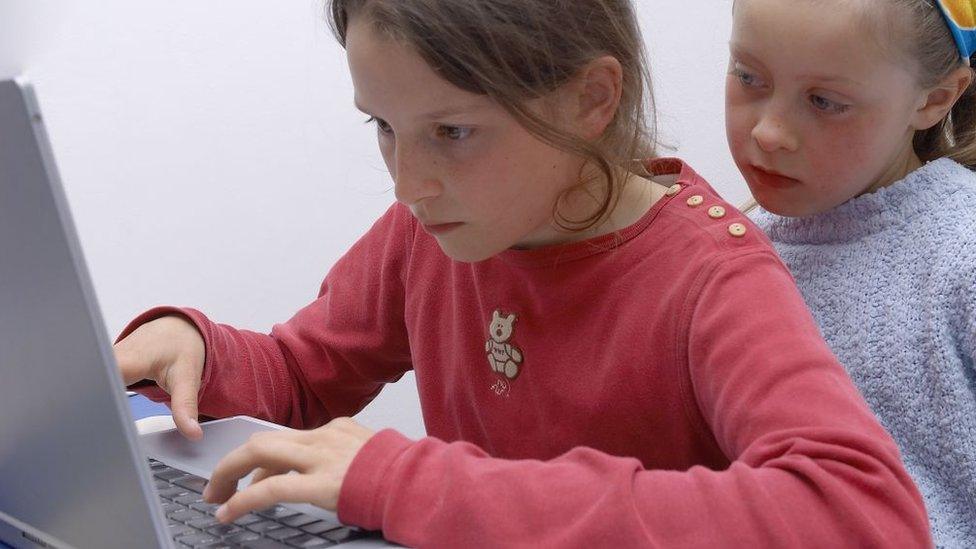 Children using laptop