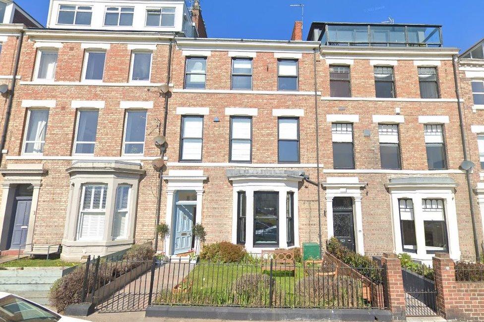 Streetview of three houses in Tynemouth with number 55 Percy Park in the middle