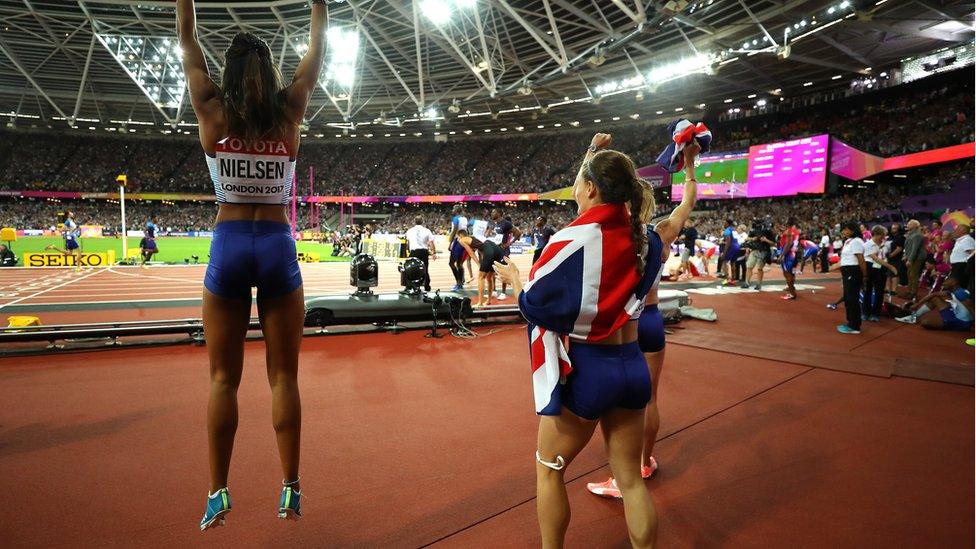 Great Britain's women cheering on men's relay team