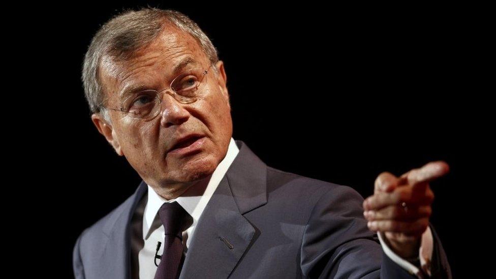 Martin Sorrell pointing on a stage