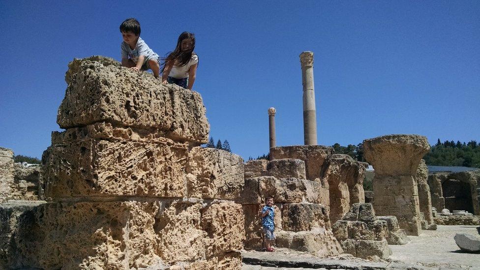 Matt Sullivan's children exploring an ancient town in Tunisia