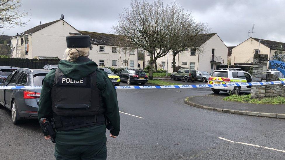 A policewoman guards the cordon in Derry on Saturday