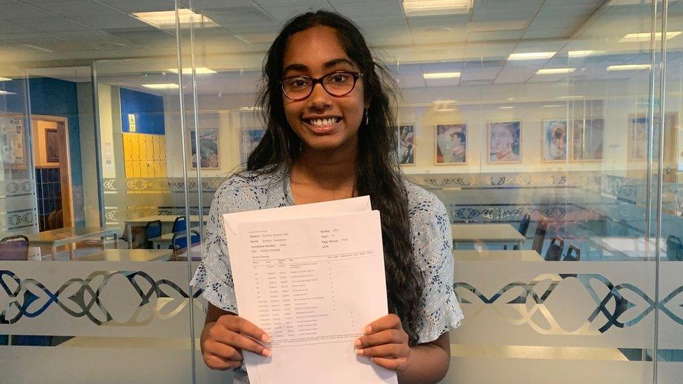 Brintha Yasodaran holding her results