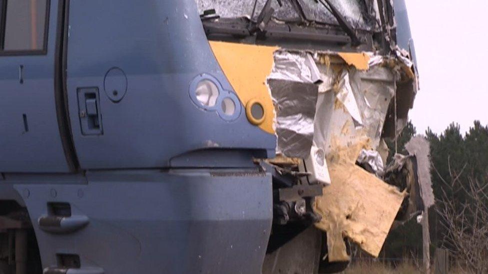 Train damaged in crash with tractor