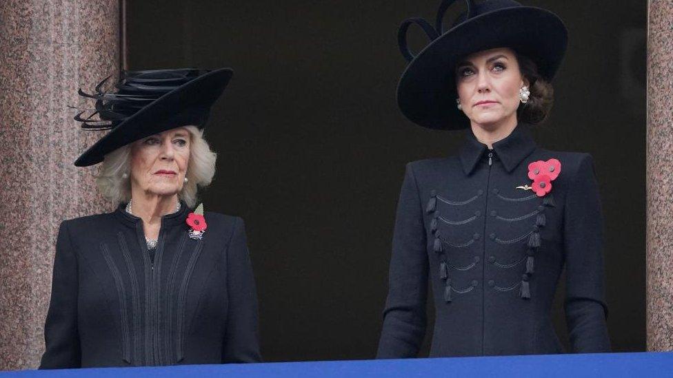 Queen Camilla and the Princess of Wales on a balcony