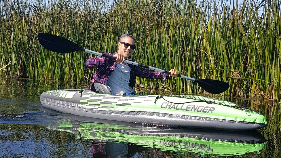 Jayden Booroff in a kayak