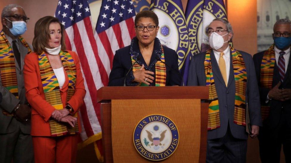 Congressional Black Caucus Chairwoman Representative Bass, flanked by House Speaker Pelosi, addresses reporters during a news conference to unveil police reform and racial injustice legislation at the U.S. Capitol in Washington