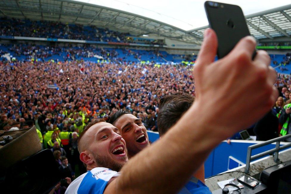 Anthony Knockaert and Jiri Skalak of Brighton & Hove Albion celebrate with team-mates