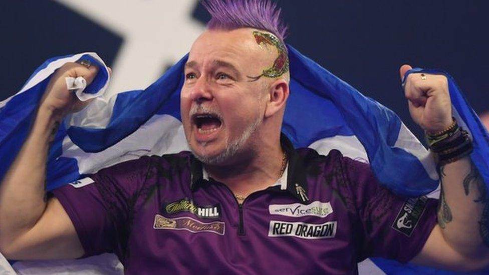 Peter Wright celebrates winning the PDC World Championship