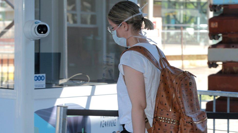 A thermal camera used to detect abnormally high body temperature among passengers arriving at Larissis railway station, in Athens, Greece