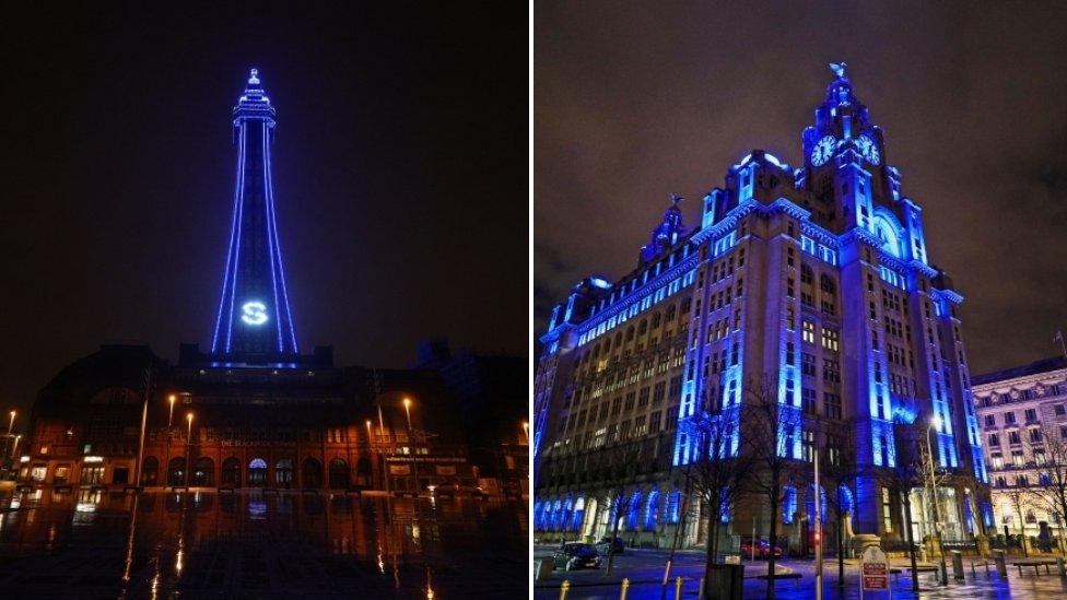 buildings lit up in blue