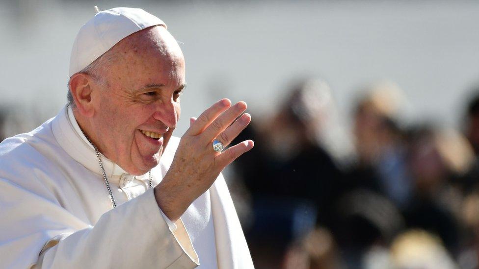 This file photo taken on March 01, 2017 shows Pope Francis waving to the crowd as he arrives for a weekly general audience at St Peters square on March 1, 2017 in Vatican.