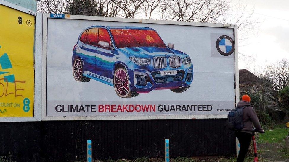 A spoof BMW advert that says 'Climate breakdown guaranteed'