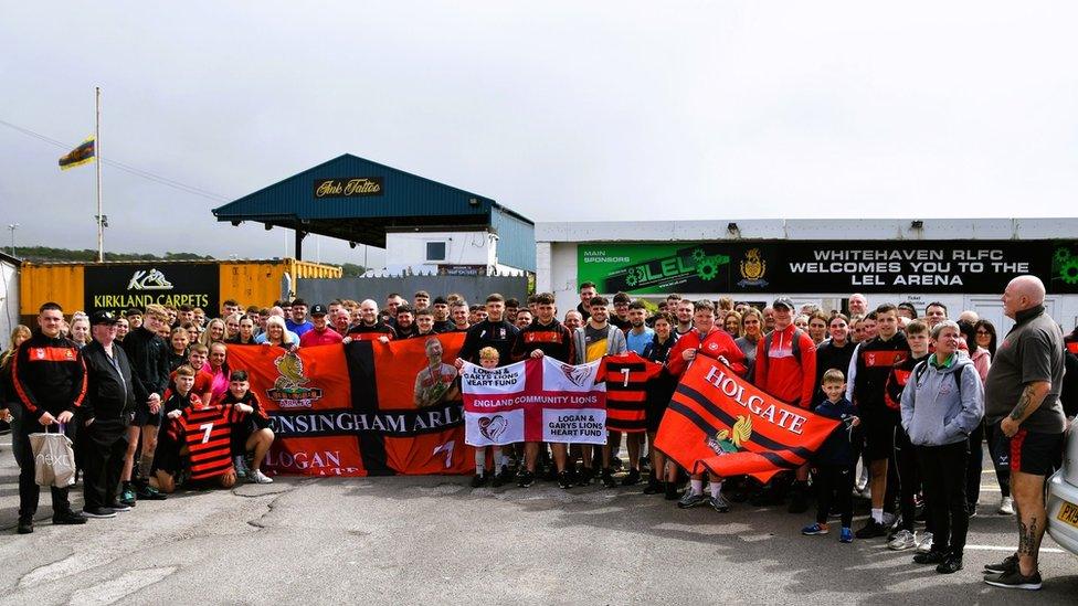 The assembled walkers at Whitehaven's ground at the completion of the walk